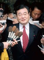 LDP's Kato responds to questions from reporters
